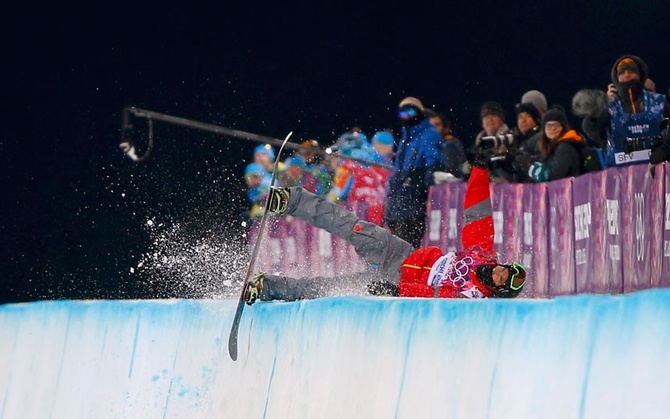Китайский сноубордист Ваньчэн Ши © Andy Wong/AP