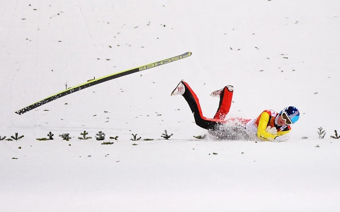 Немецкий прыгун с трамплина Зеверин Фройнд © 2014 Getty Images